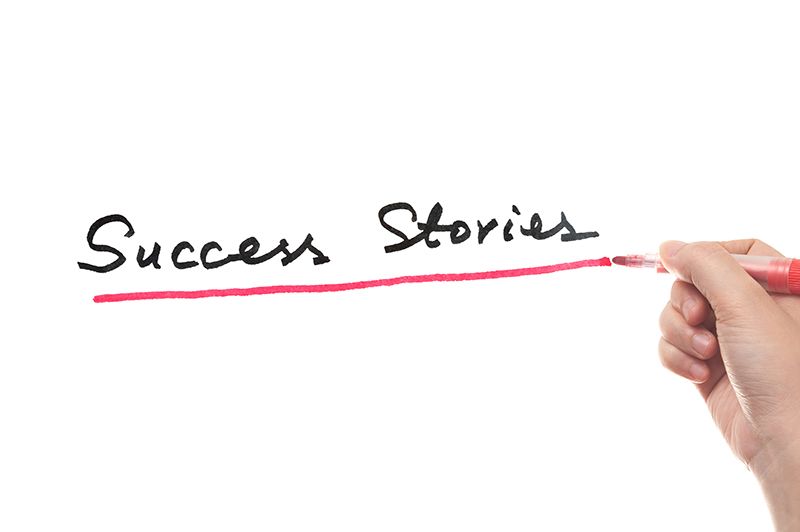 Success Stories in words written on white