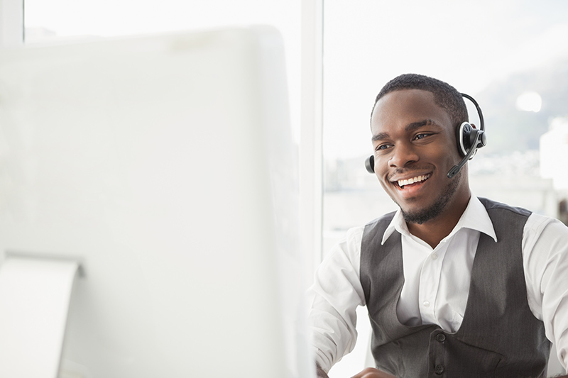 smiling businessman with headset